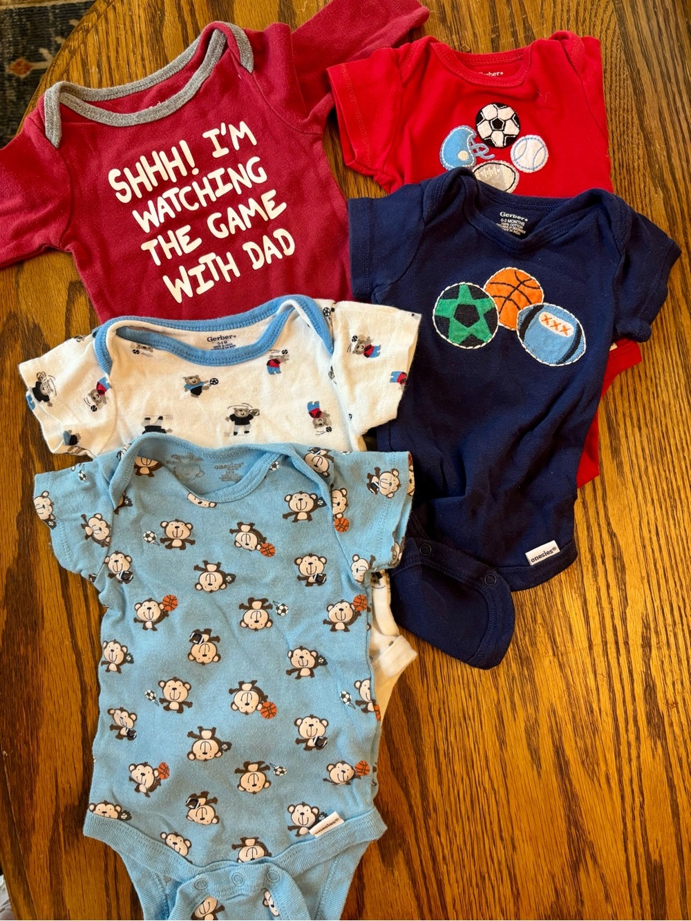 Sports themed onesie bundle